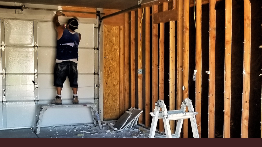 homeowner constructing a detached garage