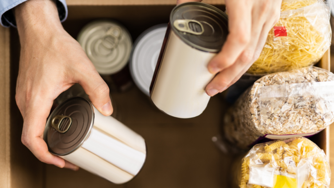 food items and cans in a box