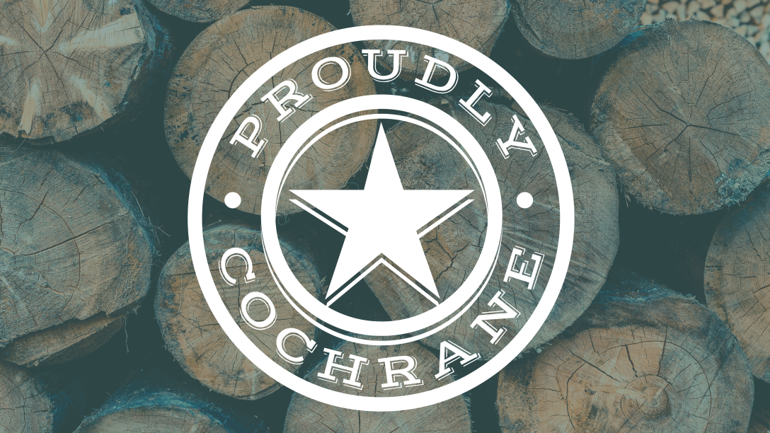 Proudly Cochrane logo on wood background