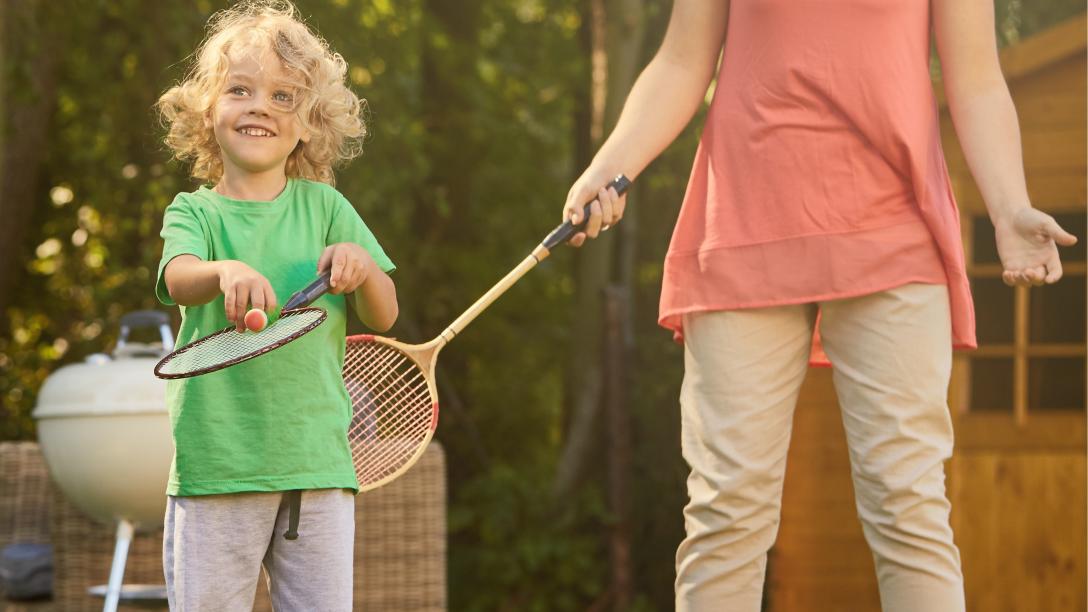 A family plays badminton