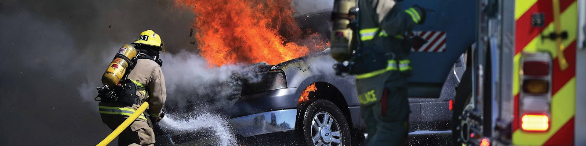 Cochrane fire services putting out a burning car