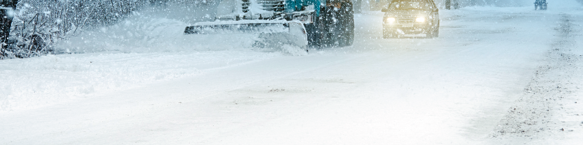 Snowplow on wintery roads