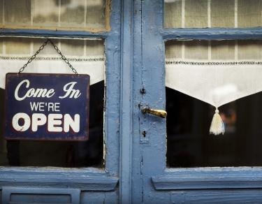 Open sign in a window