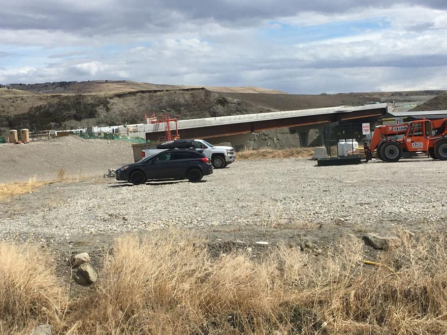 Side view of bridge under construction.