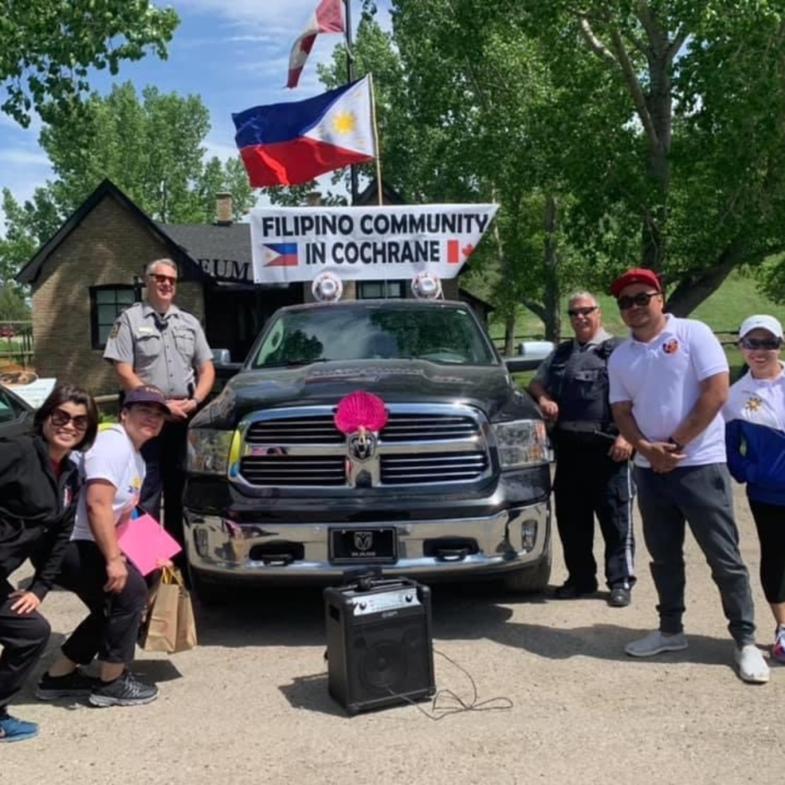 Officers posing for picture with community members 