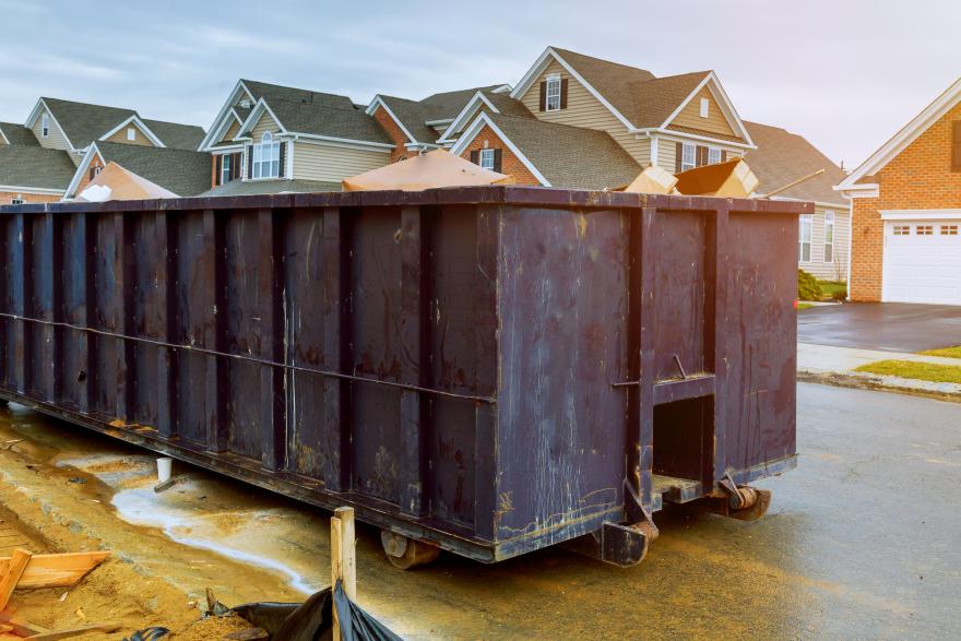 garbage-containers-near-the-new-home-blue-container