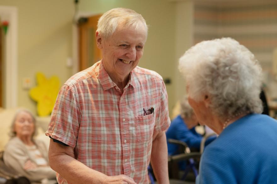 an older adult smiling