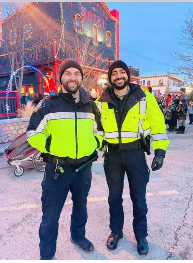 Peace Officers Mihai Stan and Saif Muthana at the Cochrane Light Up
