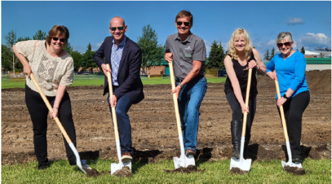 Group photo of Councillors breaking ground at new artificial turf field 