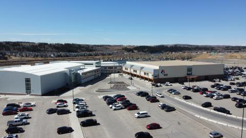 aerial view of SLS building and parking lot 