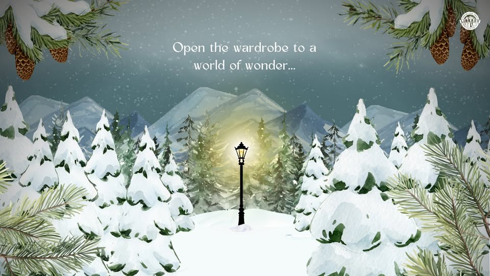 Wintery forest landscape with gas lamp post in centre. Text reads, "Open the wardrobe to a world of wonder..."