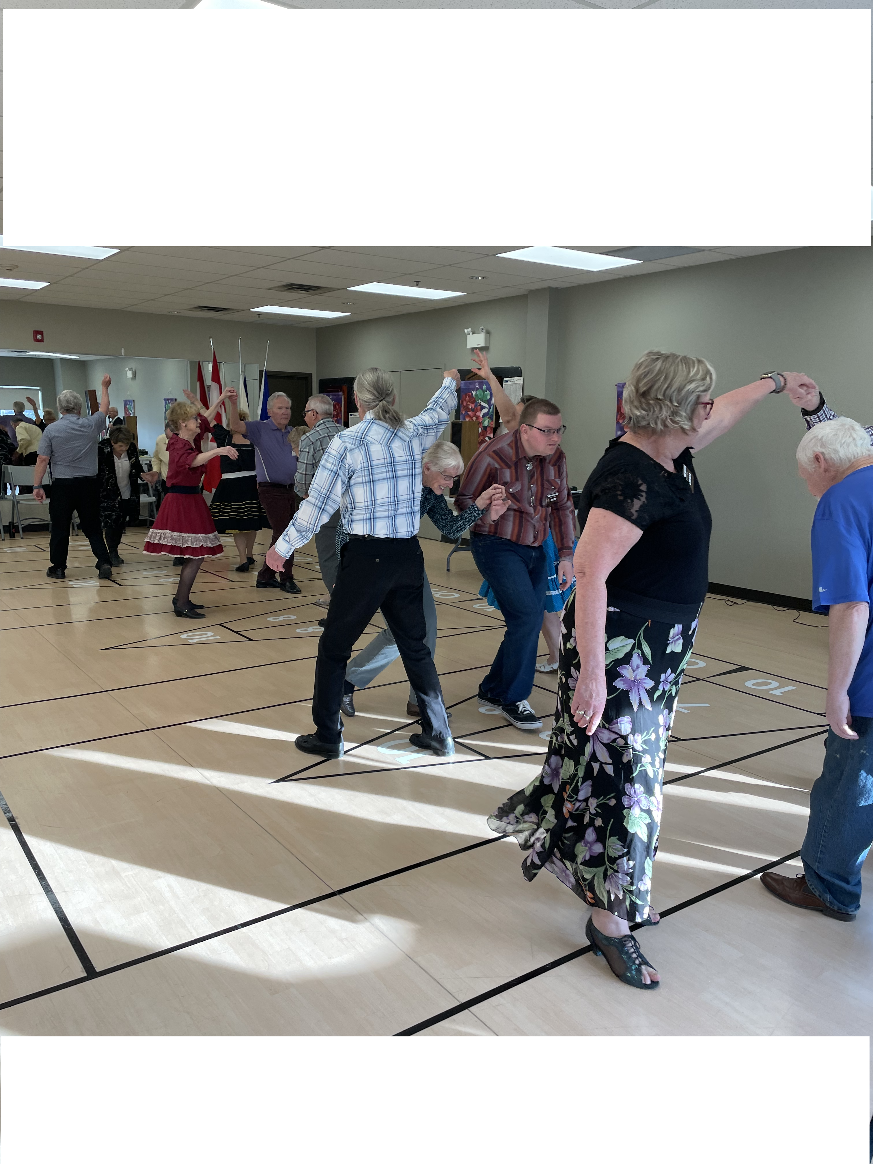 Square dancers wearing regular clothes